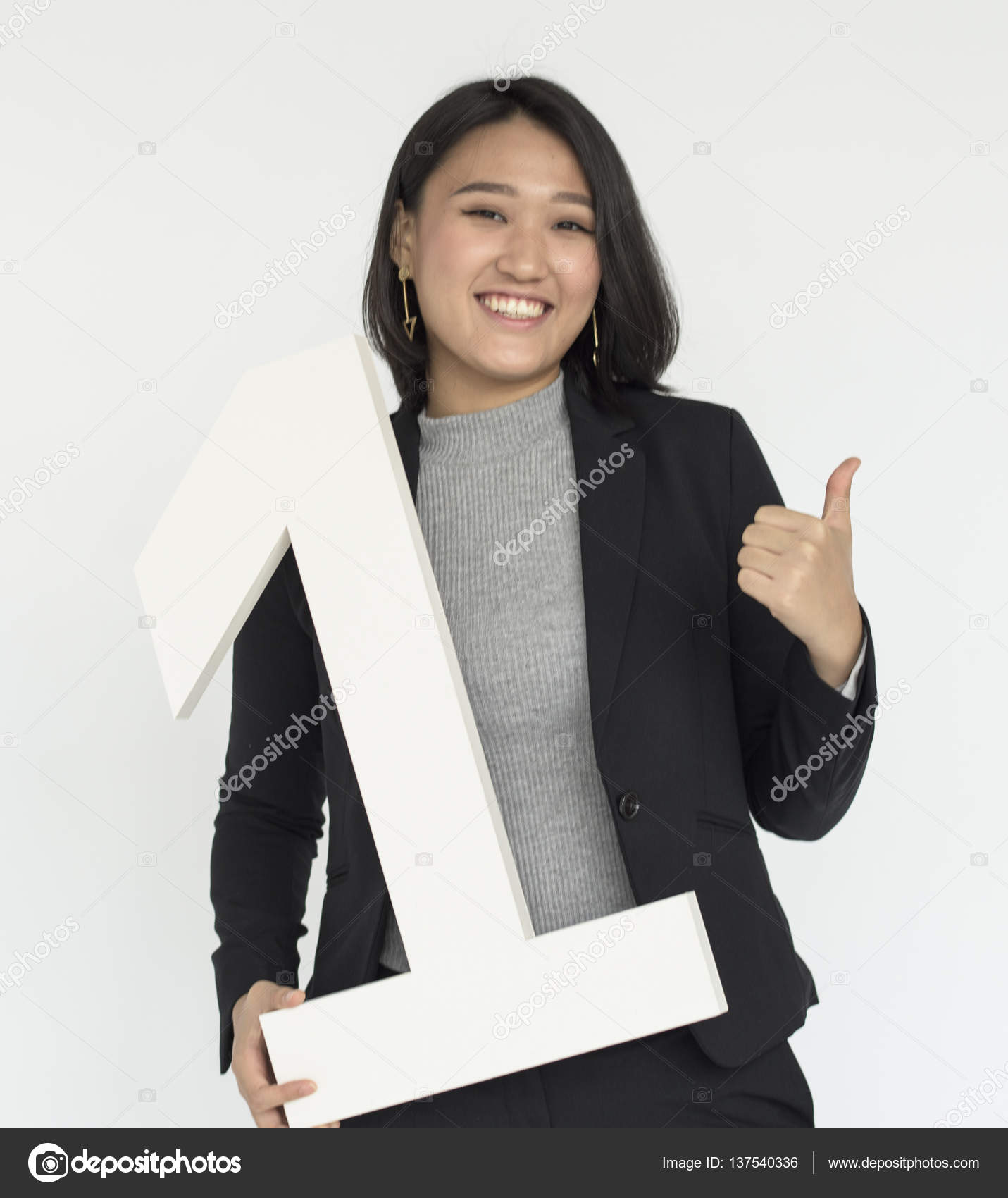 Woman holding number one sign Stock Photo by ©Rawpixel 137540336